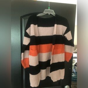 Striped woven sweater with pockets